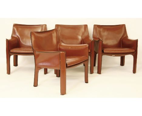 A set of four red leather upholstered armchairs (4)* This lot will be sold with VAT on the hammer price