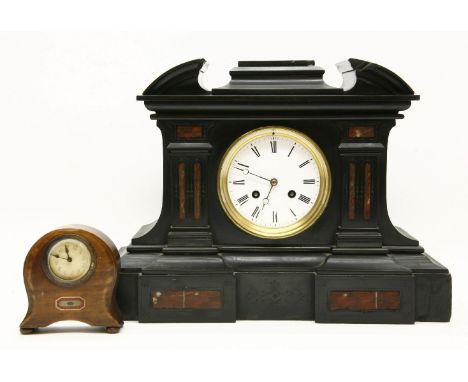 A Victorian black marble mantel clock, of architectural design together with an inlaid mahogany boudoir clock