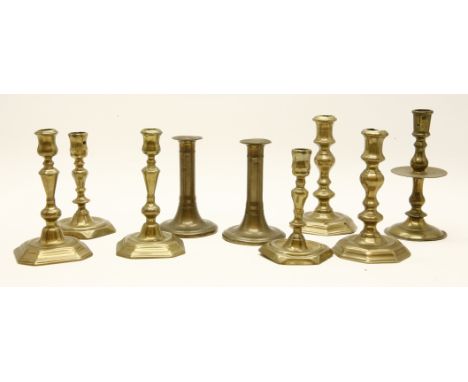 A pair of brass table candlesticks, late 18th century, 17cm high, a single Dutch-style table candlestick, with a drilled cand