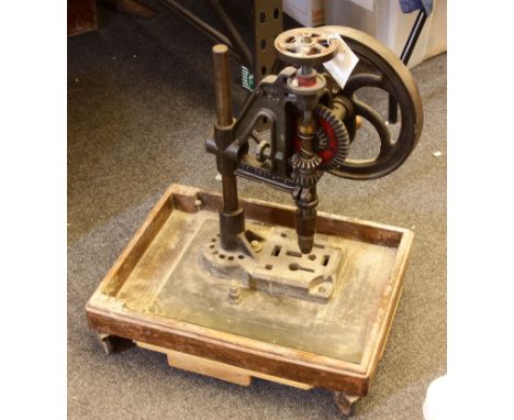 A vintage table drill