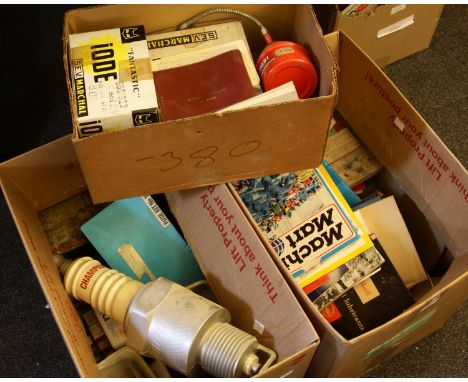 A quantity of vintage motoring books and manuals, together with vintage car parts, etc