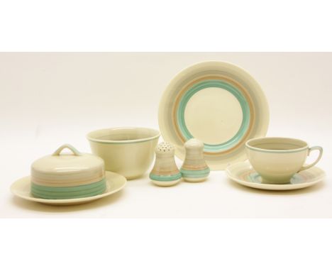 A Susie Cooper part dinner service, comprising of soup bowls, pepperettes, plates, a jug etc