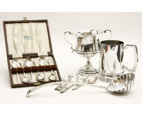 Silver items: a ladle, London 1835, with scalloped bowl; a mug, Sheffield 1929; a trophy cup, Sheffield 1947 and two sets of 