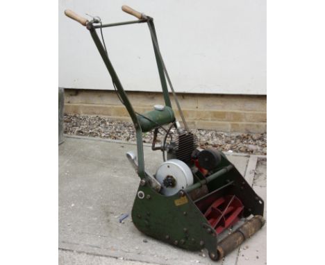 A vintage Atco petrol cylinder mower, with 14inch cut