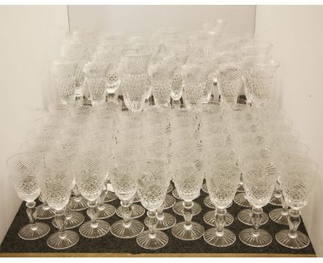 A large suite of modern glassware, to include champagne flutes and large wine glasses, each with spiral twist bowls* This lot