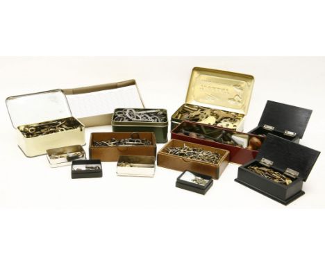 A large collection of various clock and watch keys, together with further hollow shank keys