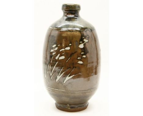 A studio pottery vase, by Jim Malone, of baluster form  with a narrow neck, with impressed mark to the foot rim, and further 