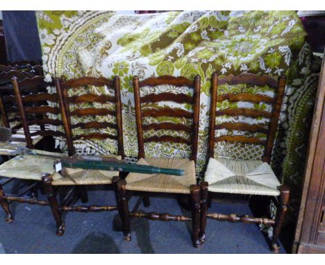 &nbsp;A HARLEQUIN SET OF 22 SIMILAR RUSH SEAT LADDER BACK CHAIRS