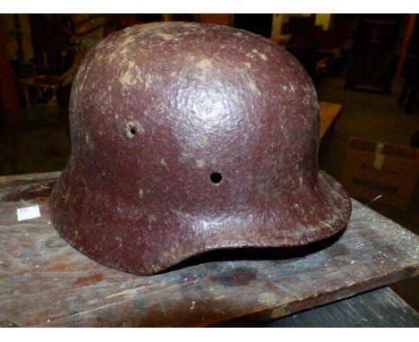 A BOX OF MILITARIA TO INCLUDE AN AMMO TIN, HURRICANE LAMP, WATER BOTTLE AND A US OR GERMAN TIN HELMET.
