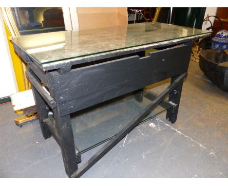 A VINTAGE PINE WORKBENCH ADAPTED TO A TWO TIER SIDE OR CONSOLE TABLE WITH GLASS TOP AND UNDERTIER.   136 x 65 x H.85cms.