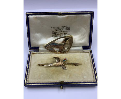 A CASED 9ct GOLD AND ENAMEL PHEASANT BROOCH SIGNED JG &amp; S TOGETHER WITH A 9ct GOLD OSPREY BROOCH DATED 1976 EDINBURGH. GR