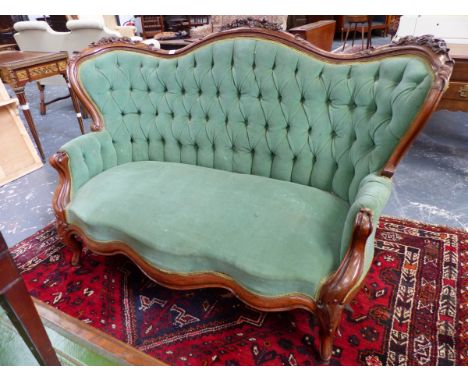 AN ANTIQUE ROSEWOOD SHOW FRAME BUTTON BACK SALON SETTEE ON CARVED CABRIOLE LEGS.   W.153cms.