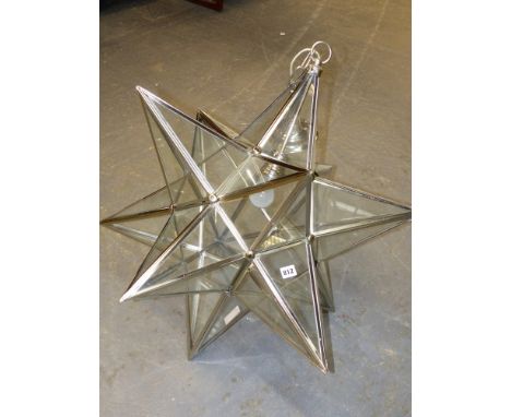 AN IMPRESSIVE LARGE STAR FORM HALL LANTERN WITH METAL FRAME AND GLASS PANELS.   H.86cms TOGETHER WITH A SIMILAR SMALLER LANTE