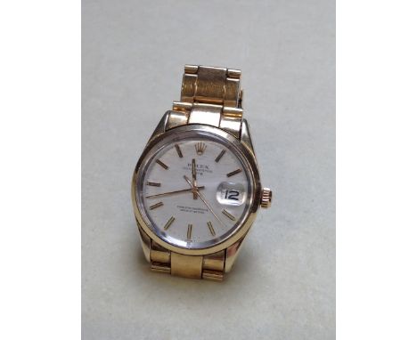 A VINTAGE ROLEX OYSTER PERPETUAL WATCH WITH DATE. WATCH REF NUMBER 1550 POSSIBLY "GOLDEN EGG". 