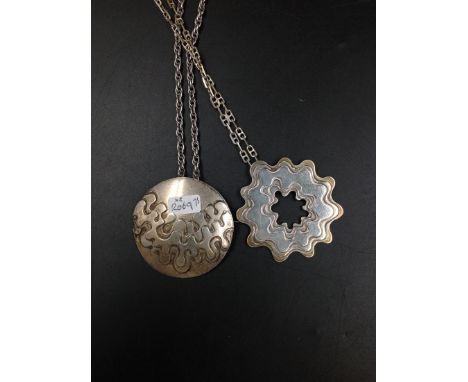 TWO VINTAGE HALLMARKED SILVER STYLIZED PENDANTS WITH CHAINS, DATED 1975, MAKERS MARK GA HH, SHEFFIELD. GROSS WEIGHT 79.3grms.
