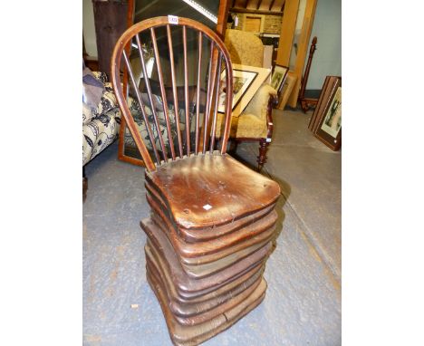 AN INTERESTING SIDE OR HALL CHAIR CONSTRUCTED FROM TWELVE 19th.C.ELM CHAIR SEATS, THE UPPER RETAINING PERIOD HOOP AND STICK B