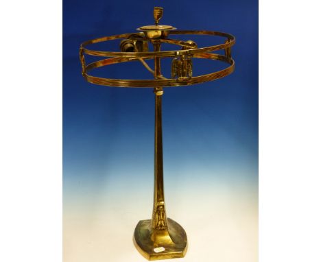 AN ART DECO BRASS TABLE LAMP WITH INTEGRAL CIRCULAR SHADE SUPPORT FEATURING FOUR PELICANS BETWEEN TWO REEDED BANDS. H 55cms.a