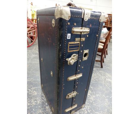 A VINTAGE WARDROBE TRUNK.   106 x 56 x 36cms.