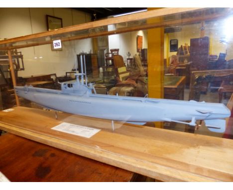A SCALE MODEL OF A SUBMARINE HMS AMPHION (P439) WITH SPEC. DETAIL. HOUSED IN PERSPEX AND OAK BOUND CASE TOGETHER WITH RELATED