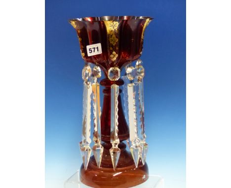 A BOHEMIAN RUBY GLASS LUSTRE.   H 36cms. TOGETHER WITH A GREEN GLASS VASE, THE FOOT PAINTED WITH SIX ROUNDELS OF FLOWERS.   H