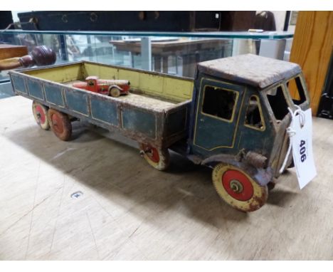 A DUNLOP FORT TIN PLATE LORRY WITH OPEN BACK.   W 33cms. TOGETHER WITH A COLLECTION OF KENSITAS SILK AND OTHER CIGARETTE CARD