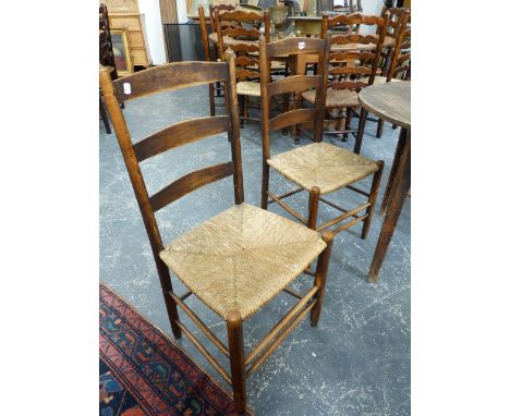 A SET OF FOUR 19th.C.ASH AND RUSH SEAT LADDER BACK SIDE CHAIRS.  (4)