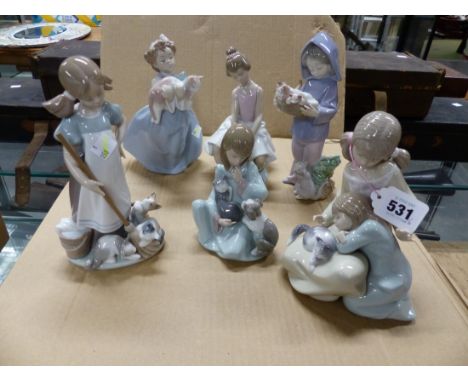 SIX LLADRO FIGURES OF GIRLS WITH CATS AND KITTENS, THE TALLEST.   H 21.5cms
