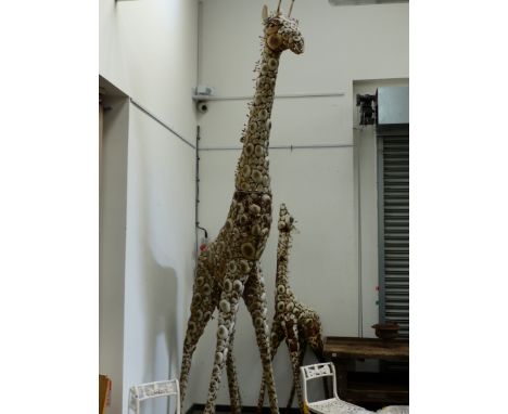 A LARGE VINTAGE HAND MADE WELDED STEEL FIGURE OF A STANDING ADULT GIRAFFE TOGETHER WITH A FOAL.   H.360 &amp; 230cms.  (2)