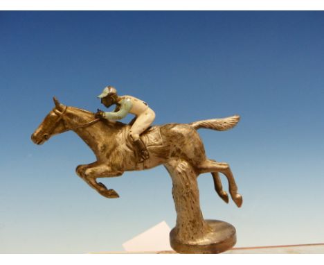 A VINTAGE CAR MASCOT IN THE FORM OF RACE HORSE OVER HURDLES WITH JOCKEY UP. 