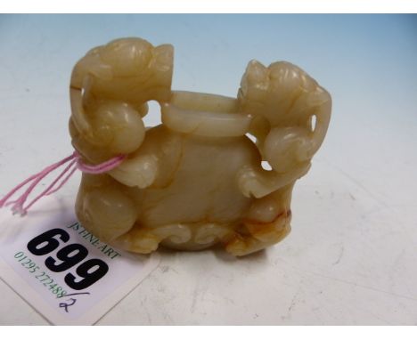 A CHINESE MUTTON FAT JADE VASE FLANKED BY TWO QILIN.   W. 5.5cms TOGETHER WITH A GREY AGATE TRIPOD CENSER WITH MASK AND RING 