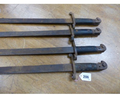 FOUR SIMILAR BAYONETS, ONE CLEARLY MARKED WILKINSON SWORD COMPANY AND /89, THE BLACK WOODEN HANDLE GRIPS DICED.   H 59.5cms.