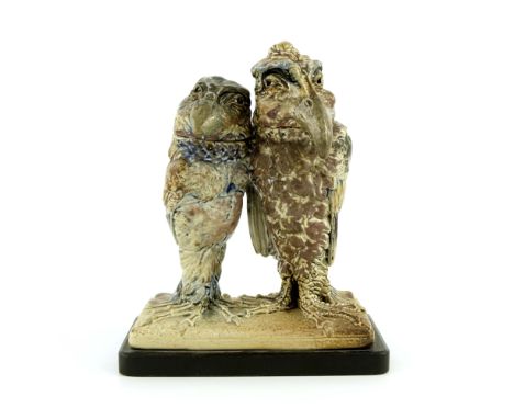Robert Wallace Martin for Martin Brothers, a stoneware sculptural twin bird figure group, 1904, modelled as a characterful pa