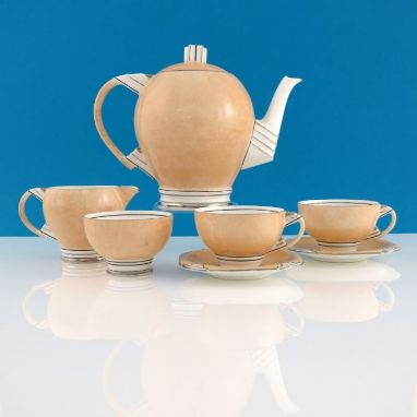A Paragon Art Deco tea set for two, circa 1933, including teapot, jug, bowl, cups and saucers, ovoid and hemispherical form w