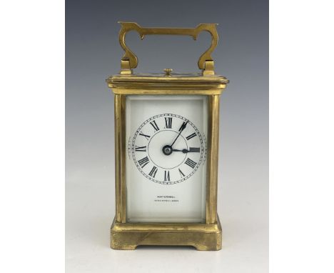 A 19th century brass repeater carriage timepiece, Hunt &amp; Roskell, striking on the hour and half, brass corniche case with