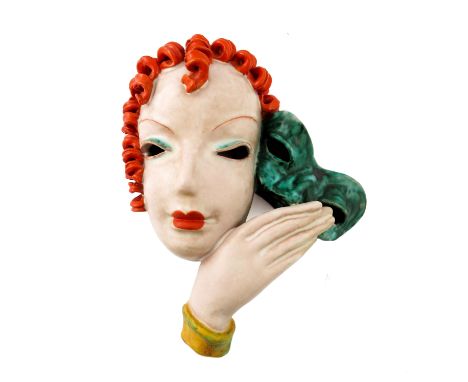 Rudolf Knorlein for Goldscheider, woman holding a Venetian style wall mask 7081, design circa 1935, incised marks 28cm high