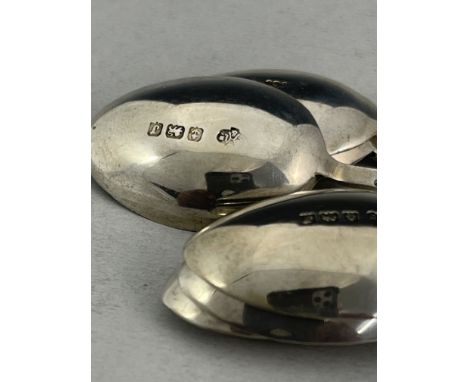A set of six Art Deco silver and enamelled teaspoons, Turner and Simpson, Birmingham 1931, arrow form handles with fletching 