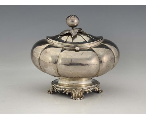 A Dutch silver tea caddy,  Pieter Pieters, Amsterdam circa 1860, lobed ovoid form on cast foliate bracket foot, the finial in