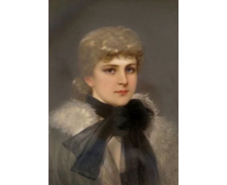 A late 19th Century KPM plaque, painted with a portrait of a young lady, bust length wearing a black scarf and fur trimmed ca