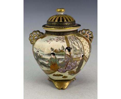 A Japanese satsuma ware koro, Meiji period, 1868-1912, gilt flower finial to the domed  reticulated cover, reticulated twin h