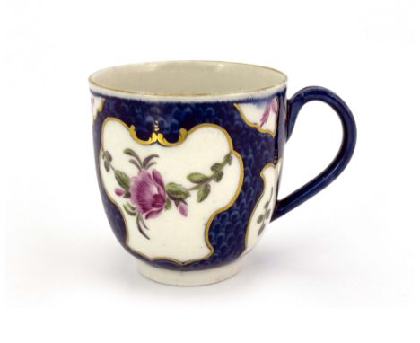 A Worcester scale blue coffee cup, crescent mark, circa 1770, painted with European flower garlands, within gilt scroll carto