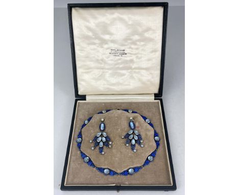 Sibyl Dunlop, an Arts and Crafts silver, enamelled and moonstone necklace and earring set, the reticulated foliate pierced pa