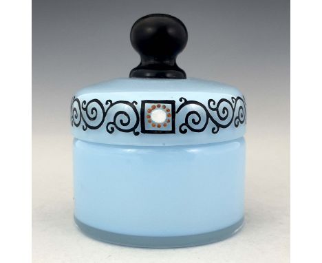A Secessionist enamelled glass box and cover, circa 1910, cylindrical form, cased blue opaque body, the lid with black enamel