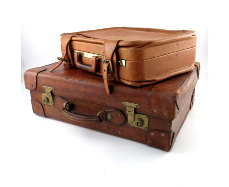 Vintage Luggage, a John Pound &amp; Co tan leather suitcase, early 20th Century, stitched with flush studded corner guards, S