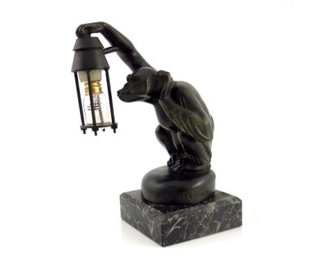 Max Le Verrier, a bronzed Boubou car mascot lamp, circa 1925, modelled as a monkey carrying a lantern, on granite base, signe