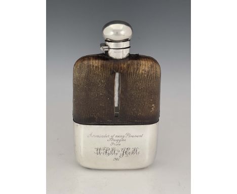 A large Edwardian silver plate and lizard skin hip flask, James Dixon and Sons, circa 1901, the glass body with removable gil