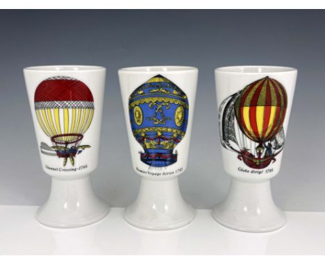 Piero Fornasetti, a set of three Mongolfiere beakers, circa 1955, conical footed cup form, transfer printed in colours with h