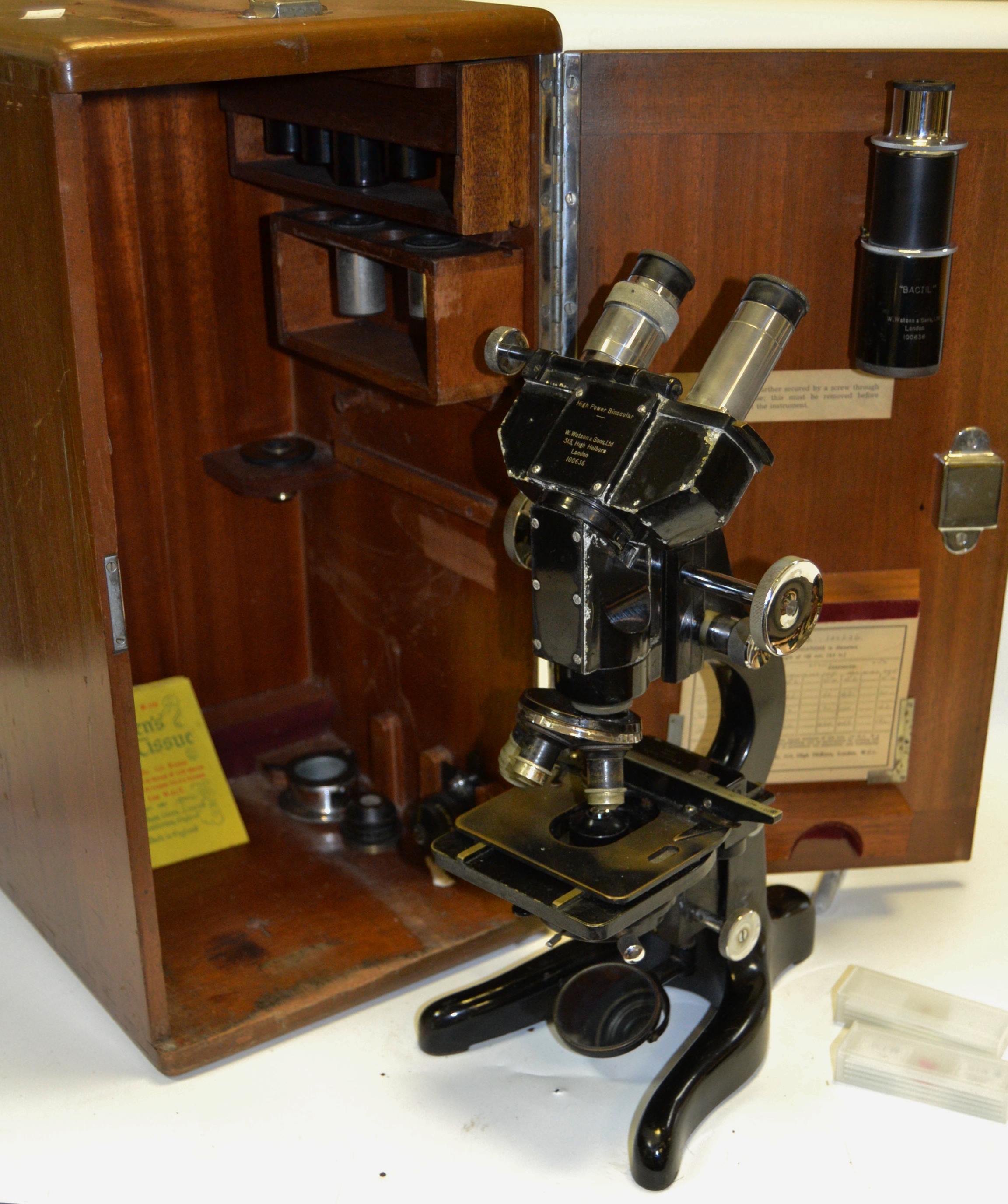A Watson high power binocular microscope No 100636, manufactured 9th