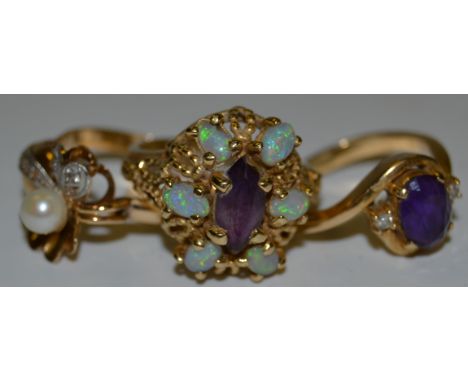 Rings - an amethyst and opaline stone cluster ring,  indistinctly marked;  others cultured pearl etc gold coloured metal shan