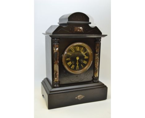 A 19th century belge noir mantel clock by Japyfreres, Paris 