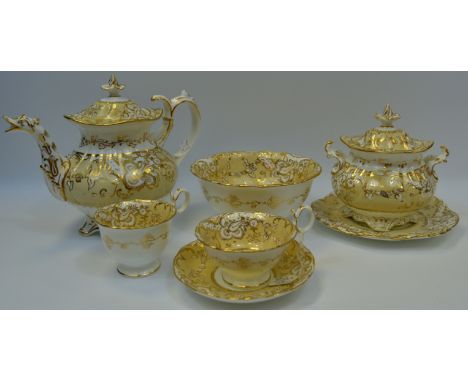 A Coalport part tea service comprising of teapot, sucrier, bowl, cup & saucer, Adelarde shape c.1840